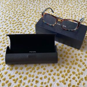 Teal women’s Prada glasses